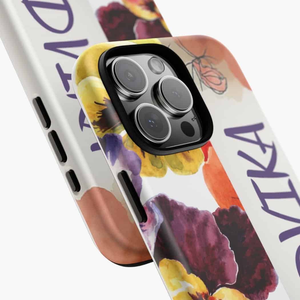 Vibrant floral phone case for iPhone with camera protection.