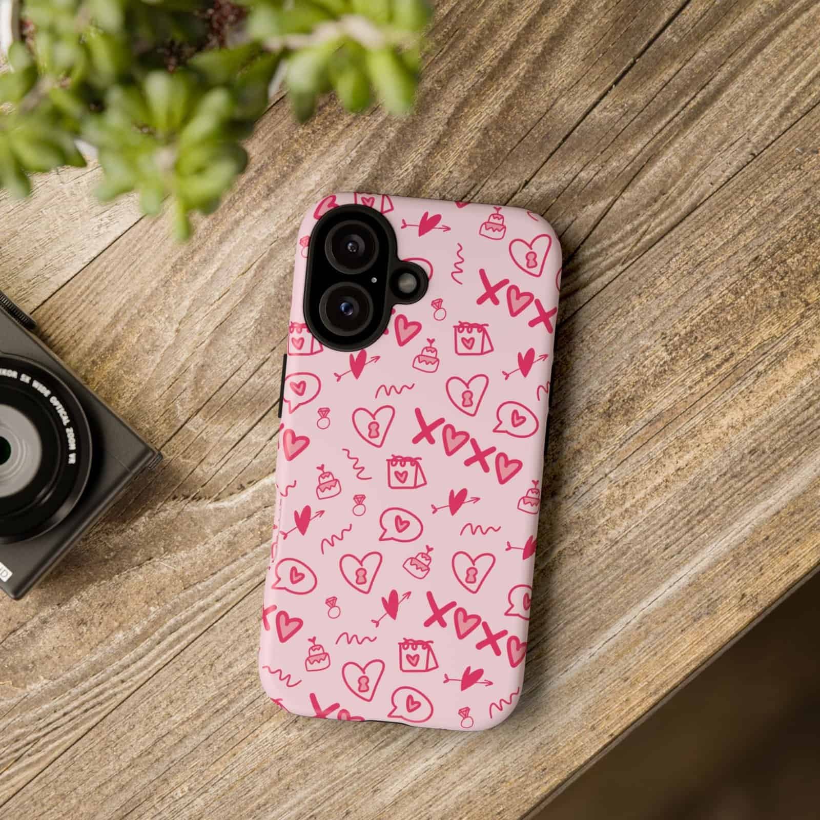 Pink heart and love-themed phone case with lock and gift icons, designed for iPhone models.